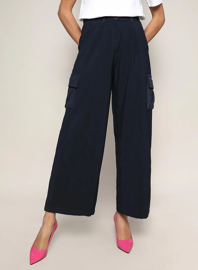 كامبوس سوترا Women's Navy Blue Baggy Cargo Pants For Casual Wear | Mid-Rise | 4 Pockets | Button Closure | Cargo Pants Crafted With Comfort Fit For Everyday Wear